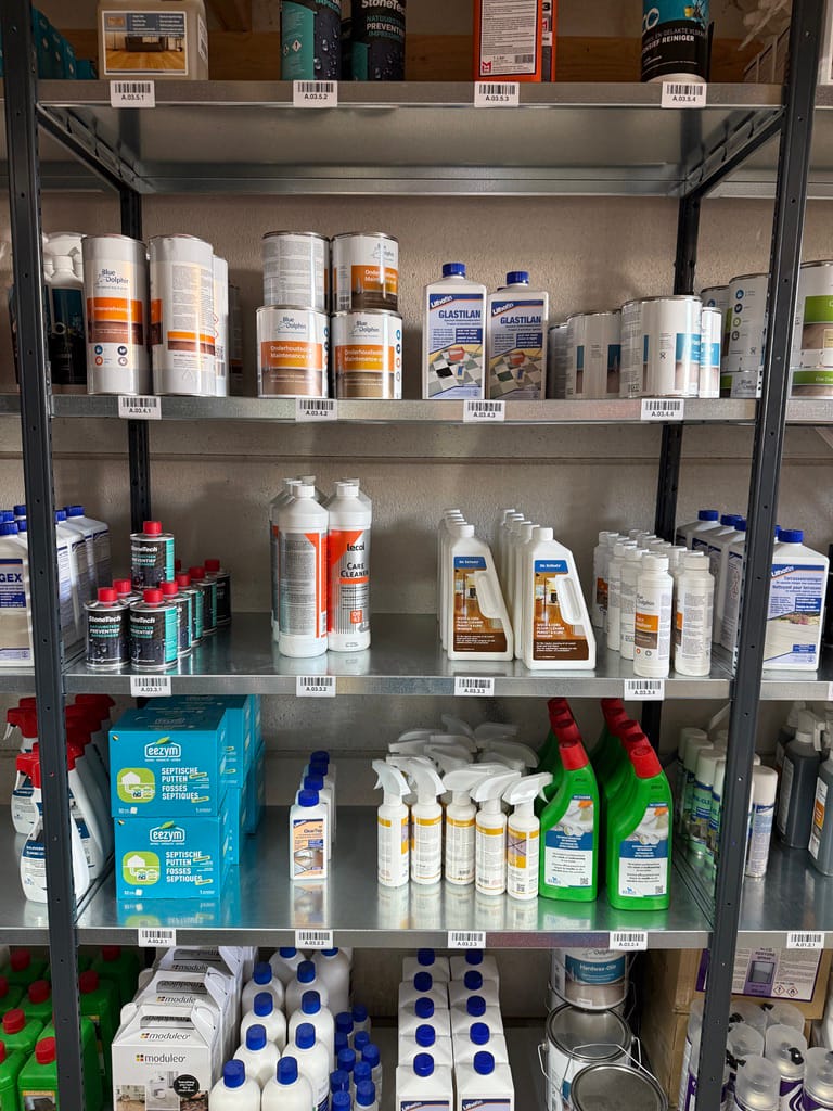 Tidy warehouse with products neatly arranged on labelled shelf locations.